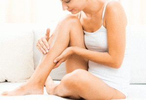 Woman-Puts-CBD-Cream-For-Pain-On-Leg