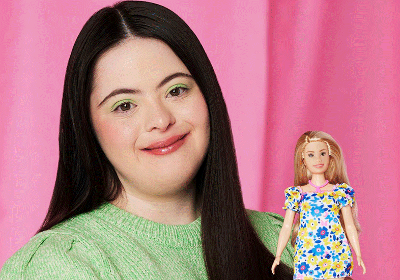 Model holds Down Syndrome Barbie. What is Down Syndrome? Can CBD help with Down Syndrome?