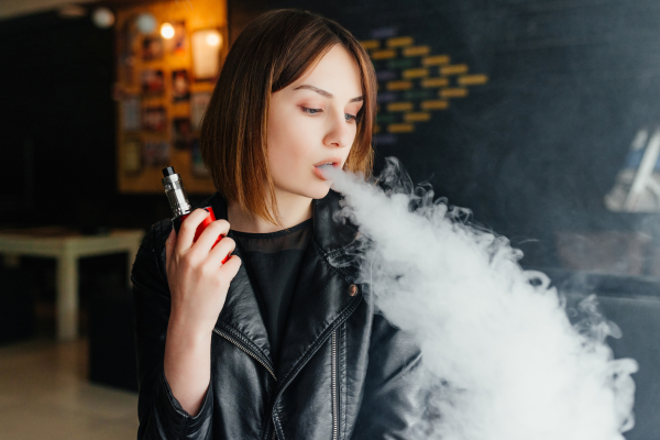 What is THC-P? Young woman seen vaping to symbolize THC-P vape cartridge.